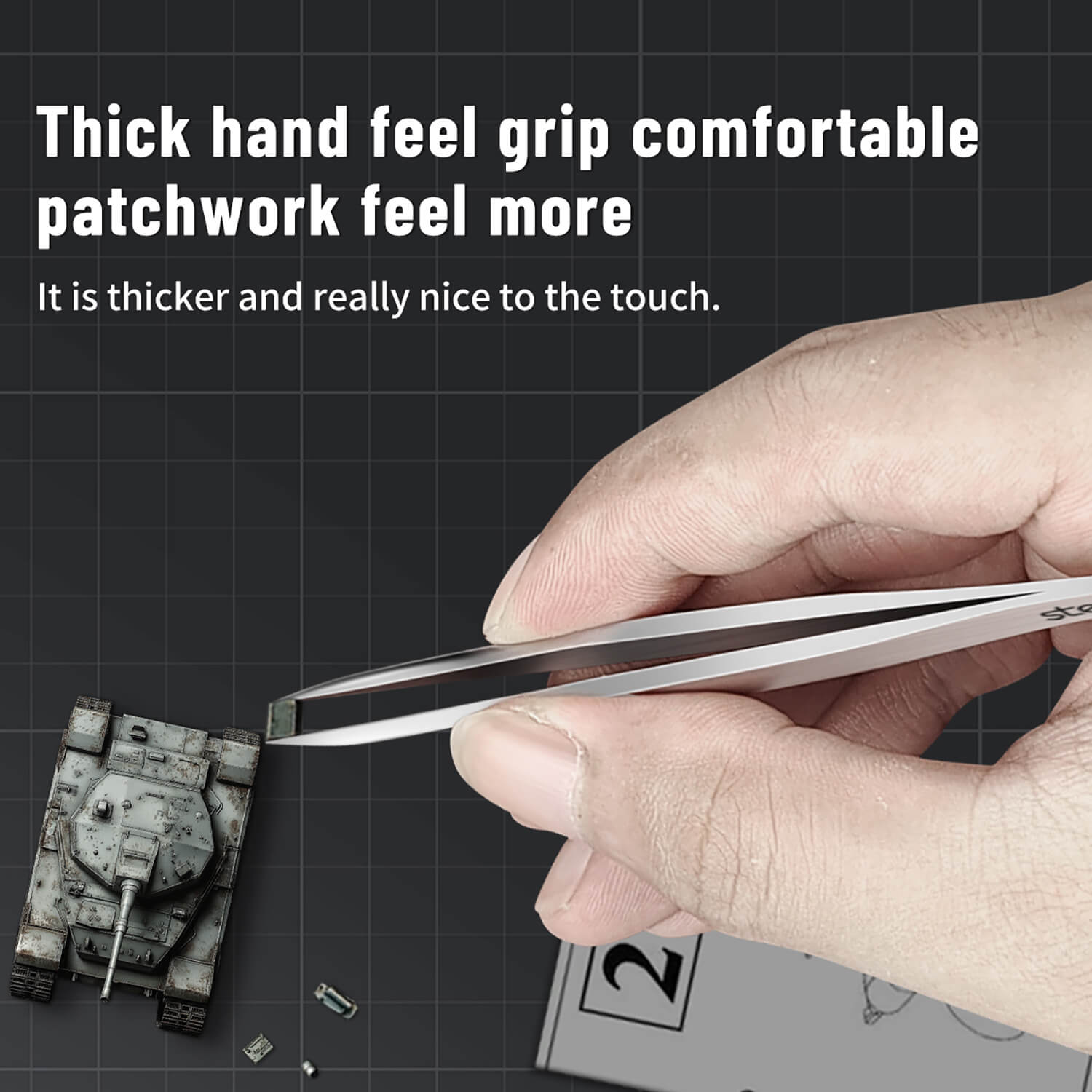 Professional modeler using stedi thick grip tweezers for tank model assembly.