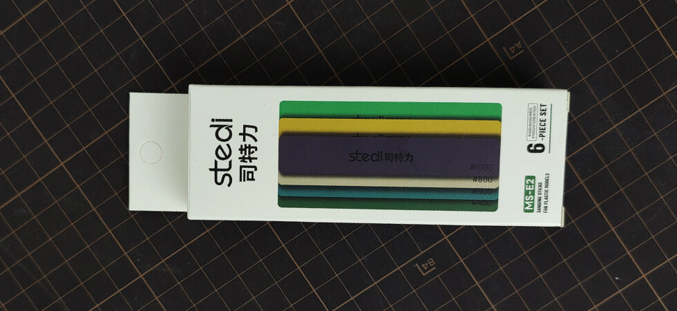 STEDI MS-E2 sanding stick package contents with multiple grit polishing sticks