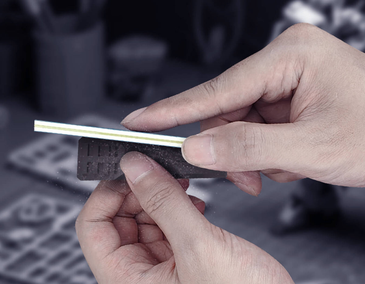 STEDI MS-E2 sanding stick polishing plastic model parts during Gunpla assembly and finishing